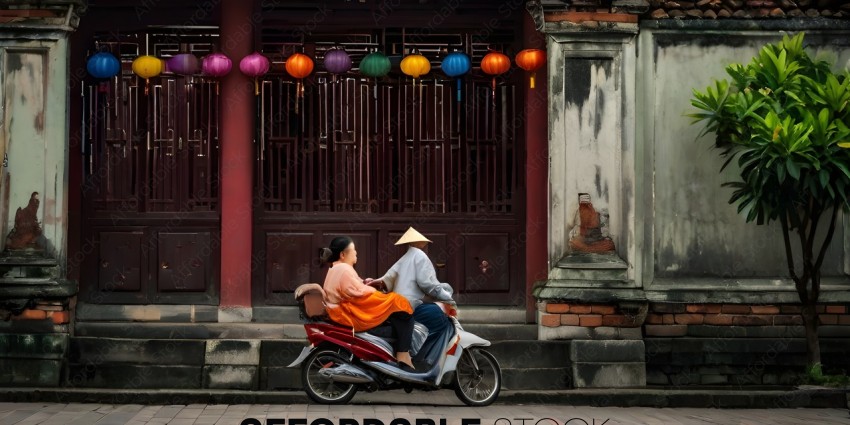 A couple riding a motorcycle with a red background