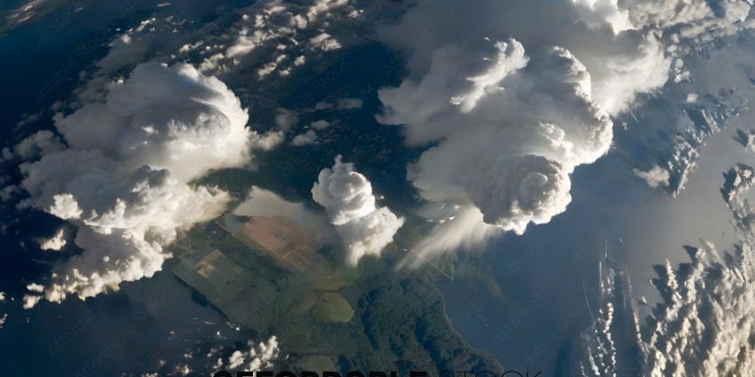 A view of the earth from above, with clouds and a field
