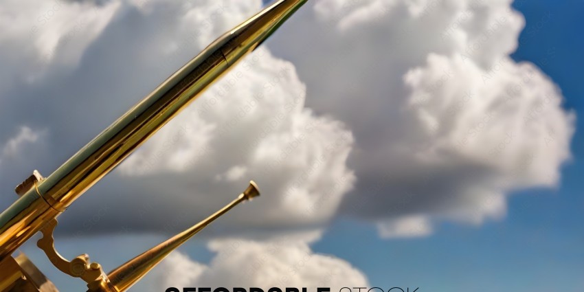 A pair of metal rods with a cloudy sky in the background