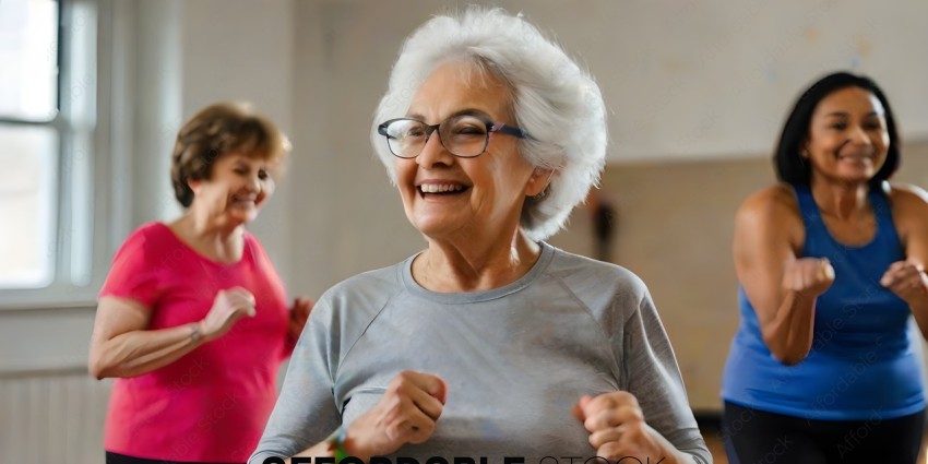 Woman in gray shirt and glasses smiling