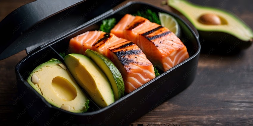 A black box of sushi with avocado, salmon, and lime