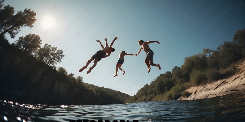 Three men jumping into the water