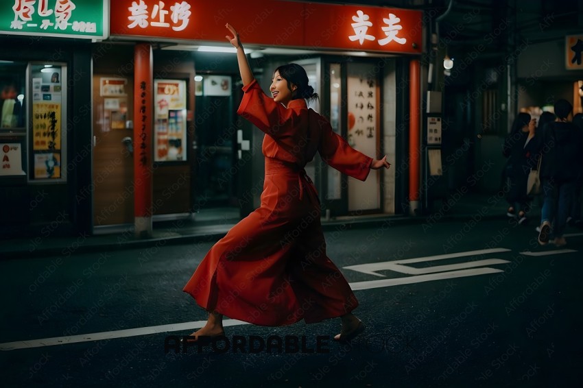 A woman in a red dress is dancing in the street