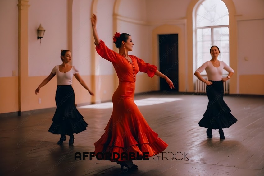A woman in a red dress is dancing