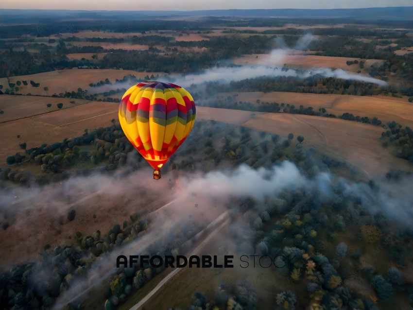 A hot air balloon flying over a field