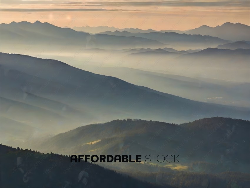 A mountain range with fog in the background