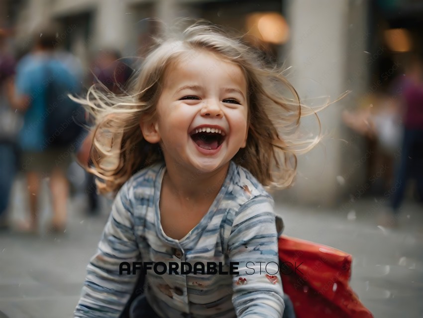 A little girl laughing and smiling while playing outside