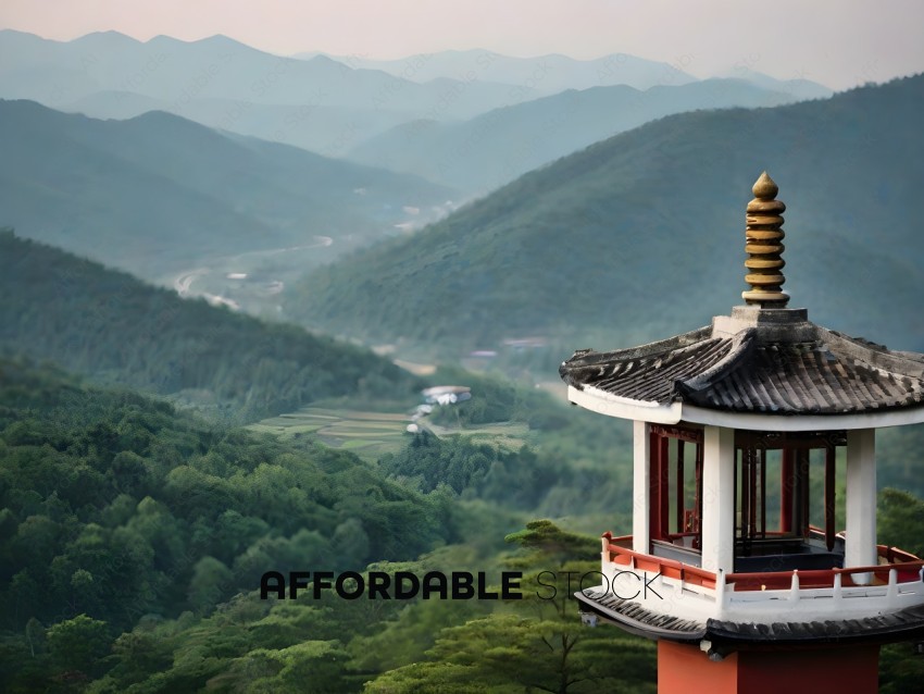 A view of a mountain range with a pagoda in the foreground