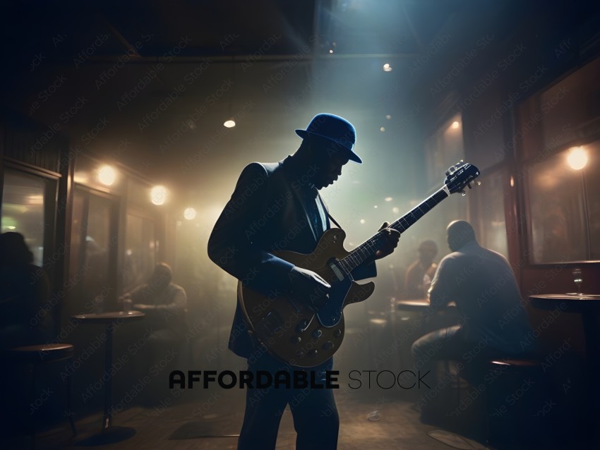 A man in a suit and hat plays guitar in a dimly lit room