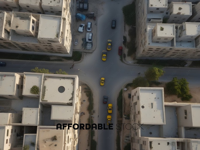 Cars driving down a street in a city