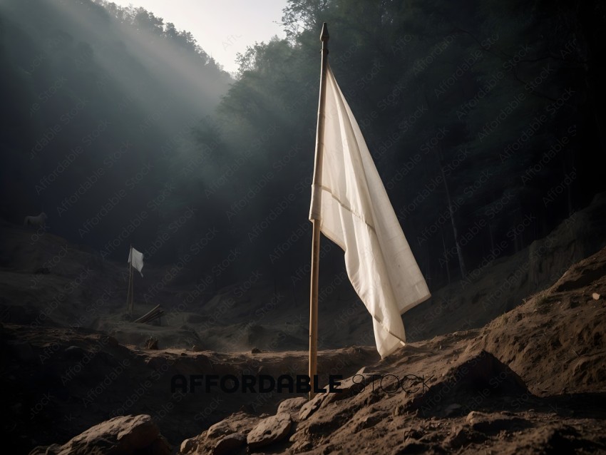 A white flag on a wooden pole in a forest