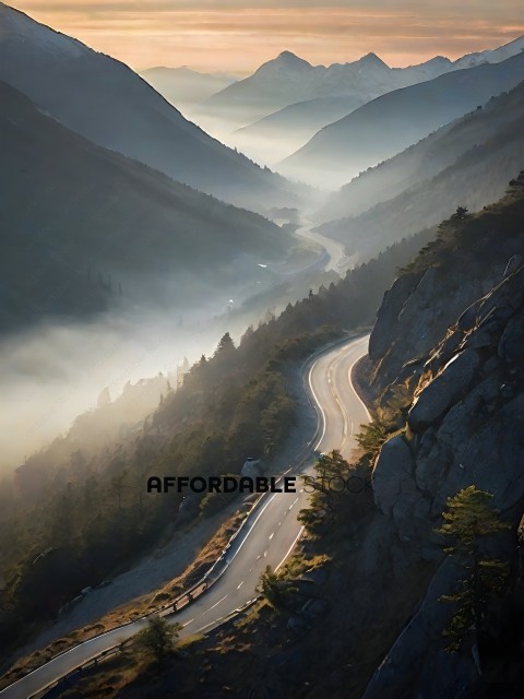 A winding mountain road with fog and trees