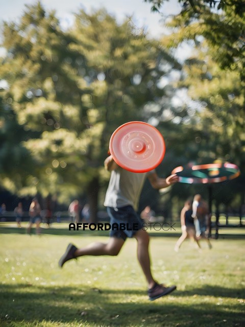 Man in Shorts and T-Shirt Running with Frisbee