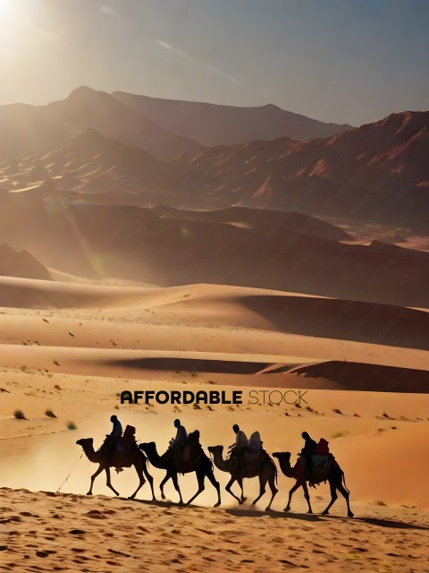 A group of people riding camels in the desert