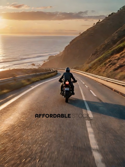 A motorcyclist rides along a scenic coastal road