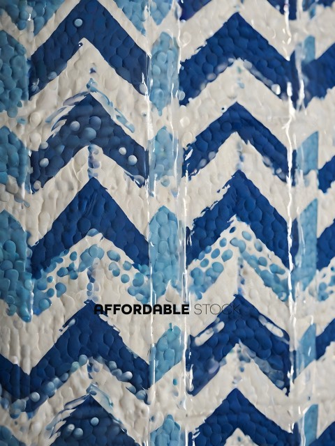 Blue and white chevron pattern with blue dots