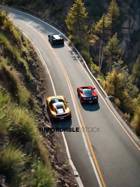 Three sports cars driving on a winding road