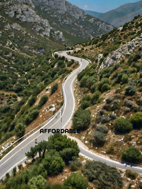 A winding road through a mountainous area