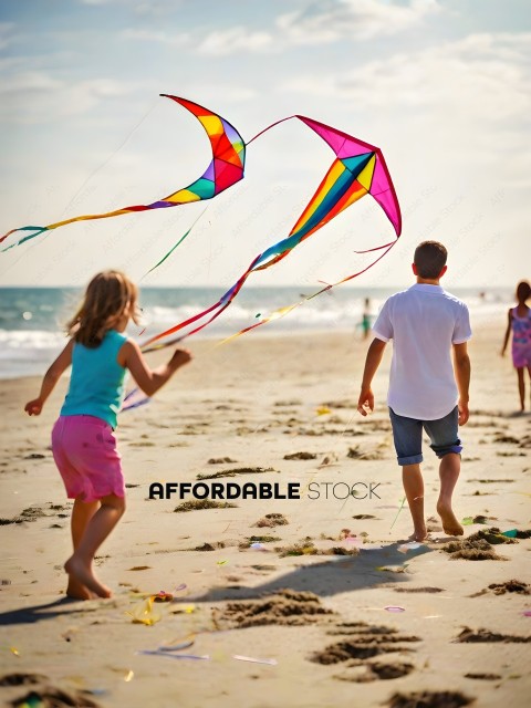 Two children flying kites on the beach