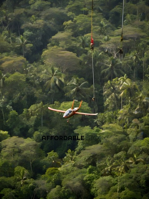 A man is flying a red and white airplane through the jungle