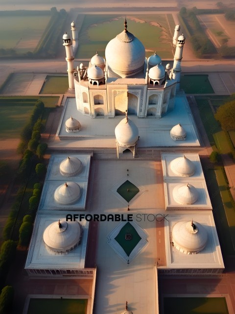 A large white building with a dome and four smaller domes