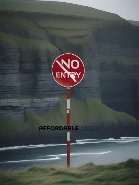 A red sign with white lettering that says "No Entry" on a cliff
