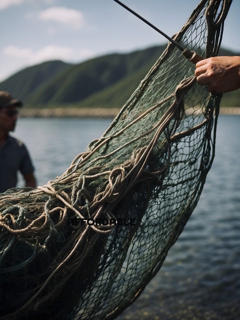 A person holding a net full of fish