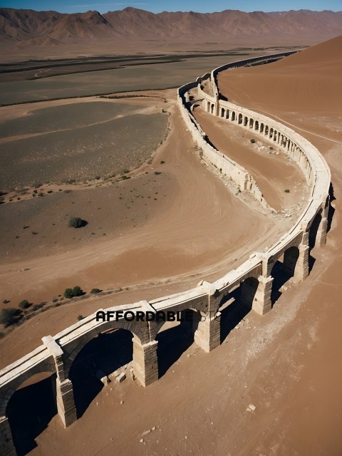 An aerial view of a bridge with a desert landscape