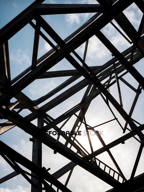 A view of a metal structure with sunlight shining through