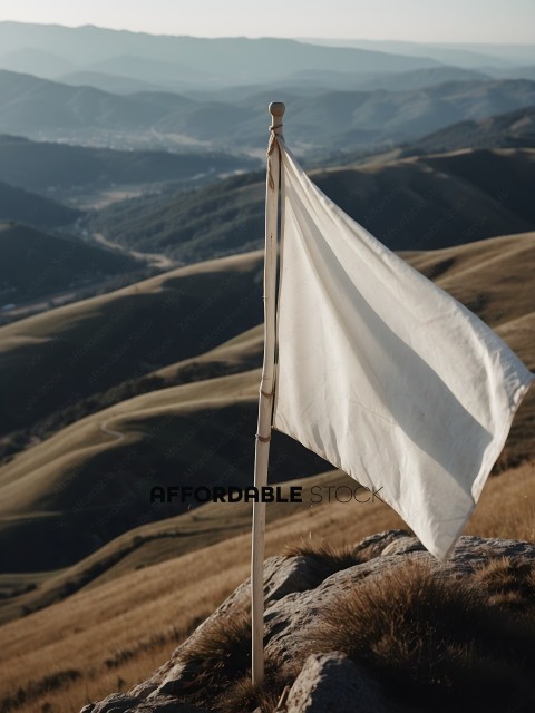 A white flag on a rocky hillside