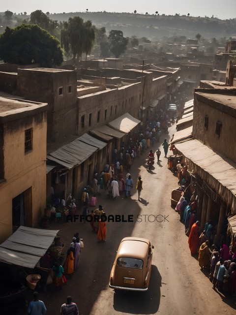 A busy street in India with a car and many people