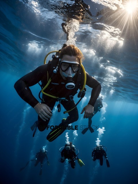 Divers in the ocean with their gear on