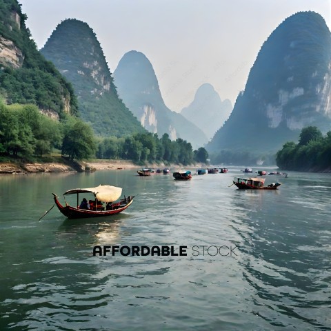 A group of boats on a river with mountains in the background