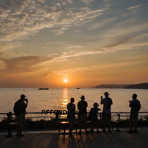 People Watching Sunset on Ocean