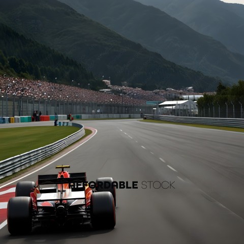 A Racer Drives Down a Track in a Mountainous Region