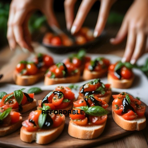 A person is cutting up tomatoes and basil to make a small appetizer