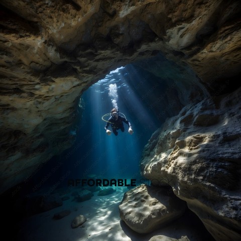 Diver in a cave with a blue light